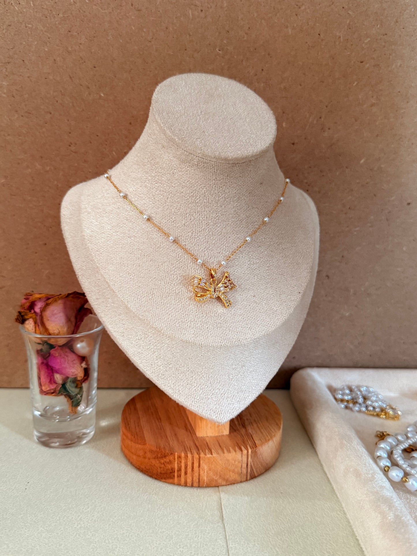 Pearl Necklace with bow fly charm